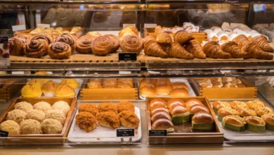 Freshly baked assorted pastries and buns on display at one of the best bakers in dehradun